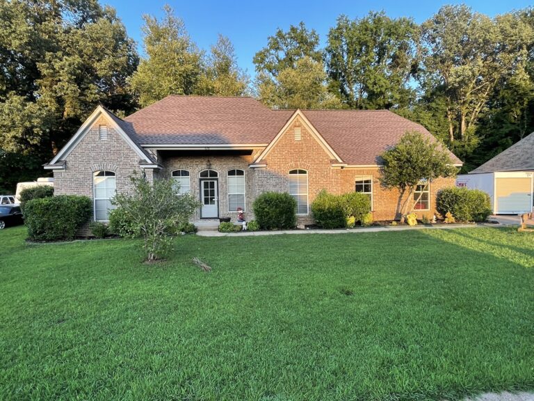 brick residential house brown asphalt roof summit project