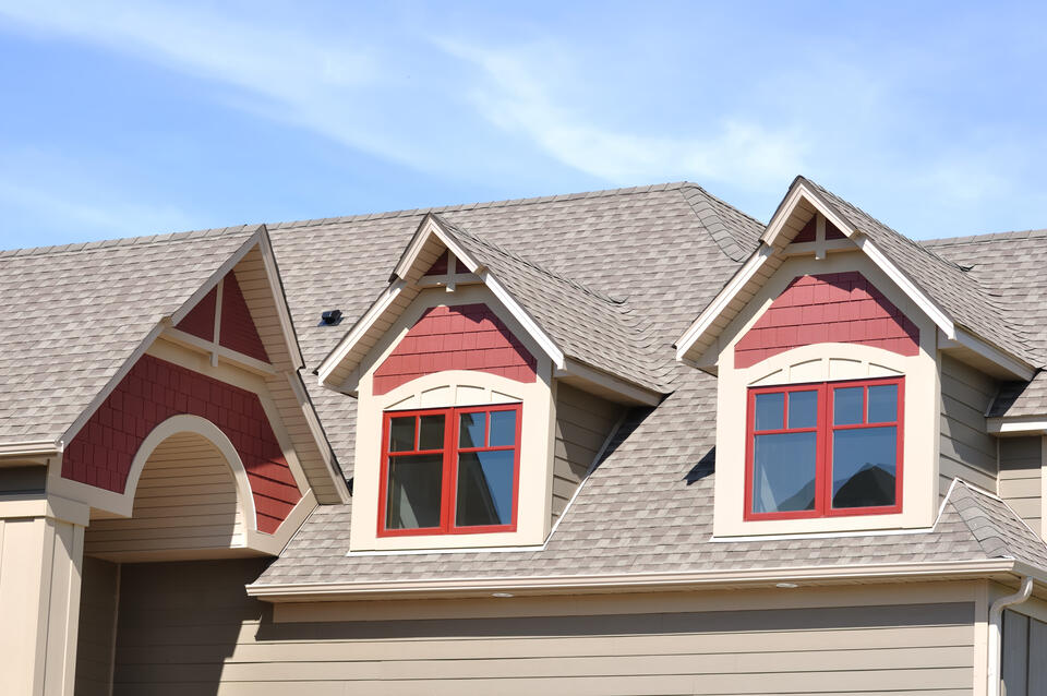 architectural shingles-gable dormers on residential home with architectural shingles