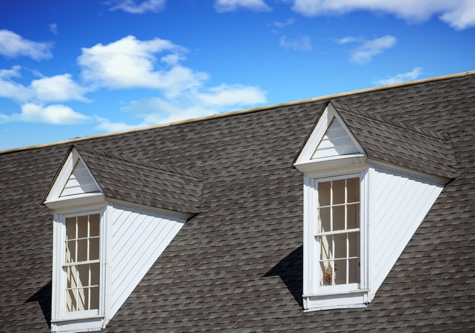 types of roof shingles-asphalt shingles on roof with dormers