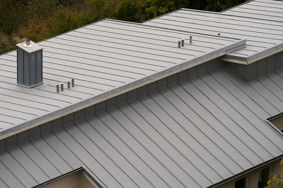 aerial view of gray metal seam roof